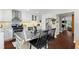 Modern kitchen with stainless steel appliances, white cabinets, and a central island at 3085 Balearic Se Dr, Marietta, GA 30067