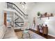 Spacious living room boasts a soaring staircase, modern decor, and comfortable seating at 3085 Balearic Se Dr, Marietta, GA 30067