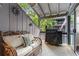 Comfortable patio featuring outdoor seating with a grill, privacy, and views of green surroundings at 3085 Balearic Se Dr, Marietta, GA 30067