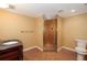 Bathroom featuring a walk-in shower with glass door and a classic vanity sink, all in a compact layout at 1800 East Gate Dr, Smoke Rise, GA 30087