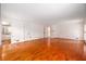 Spacious living room features hardwood floors and neutral walls, providing a versatile and inviting atmosphere at 1800 East Gate Dr, Smoke Rise, GA 30087