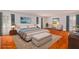 Tranquil main bedroom features neutral tones, natural light, and curated decor for a serene retreat at 1800 East Gate Dr, Smoke Rise, GA 30087