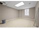 Basement room with tiled floor and natural light from the window at 4819 Elam Rd, Stone Mountain, GA 30083