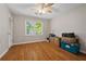 Bedroom with hardwood floors, and window for natural light at 4819 Elam Rd, Stone Mountain, GA 30083