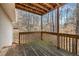 Outdoor wooden deck with views of surrounding trees at 510 Ashland Manor Dr, Lawrenceville, GA 30045
