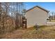View of the home's siding with a balcony and outdoor stairway at 510 Ashland Manor Dr, Lawrenceville, GA 30045