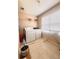 Well-lit laundry room with a washer, dryer, storage shelf and a bright window at 510 Ashland Manor Dr, Lawrenceville, GA 30045