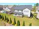Spacious backyard features a well-manicured lawn and tasteful landscaping for outdoor enjoyment at 715 Laura Jean Court, Buford, GA 30518