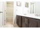 Bathroom features a double sink vanity and enclosed shower area at 715 Laura Jean Ct, Buford, GA 30518