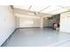 Spacious garage with custom cabinetry for storage at 715 Laura Jean Ct, Buford, GA 30518