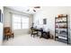 Bright home office includes work space and shelving at 715 Laura Jean Ct, Buford, GA 30518