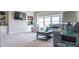 Relaxing living room with built-in shelving and comfortable seating at 715 Laura Jean Ct, Buford, GA 30518