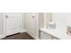 Mudroom with a bench, storage, and access to the garage at 715 Laura Jean Ct, Buford, GA 30518