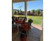 Inviting outdoor living space with view of beautifully landscaped yard at 715 Laura Jean Ct, Buford, GA 30518