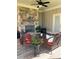 Inviting outdoor living space with stone fireplace and comfortable seating area at 715 Laura Jean Ct, Buford, GA 30518