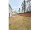 Expansive backyard featuring newly laid sod, perfect for outdoor activities and landscaping at 120 Cedar Cliff Ct, Temple, GA 30179