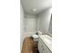 Bright bathroom features a shower-tub combo and white vanity with granite countertop at 120 Cedar Cliff Ct, Temple, GA 30179