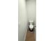 Compact powder room featuring a toilet and neutral wall paint at 120 Cedar Cliff Ct, Temple, GA 30179