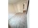 View of a carpeted bedroom with neutral walls and white doors at 120 Cedar Cliff Ct, Temple, GA 30179