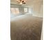 Large bedroom has plush carpeting, a ceiling fan, and large windows for natural light at 120 Cedar Cliff Ct, Temple, GA 30179