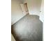 View of a carpeted bedroom with neutral walls and white doors at 120 Cedar Cliff Ct, Temple, GA 30179