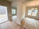 A view of the dining room showcasing large windows and natural light at 120 Cedar Cliff Ct, Temple, GA 30179