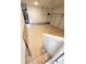 View of garage with epoxy flooring, garage door opener and water heater at 120 Cedar Cliff Ct, Temple, GA 30179