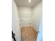 View of a laundry room with wire shelving and appliance connections at 120 Cedar Cliff Ct, Temple, GA 30179