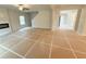 Spacious living room showcasing a modern fireplace and staircase at 120 Cedar Cliff Ct, Temple, GA 30179