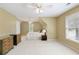 Spacious bedroom with large windows and a neutral color palette for a serene atmosphere at 325 N Saint Phillip Ln, Alpharetta, GA 30022