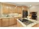 Kitchen features granite countertops, stainless steel appliances, and a built-in oven at 325 N Saint Phillip Ln, Alpharetta, GA 30022