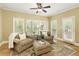 Sunroom with hardwood floors and great natural light, perfect for a relaxing space at 325 N Saint Phillip Ln, Alpharetta, GA 30022