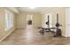 Bonus room with exercise equipment and neutral paint, perfect for fitness enthusiasts at 325 N Saint Phillip Ln, Alpharetta, GA 30022