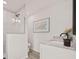 Bright bathroom featuring a glass enclosed shower, granite counters and neutral walls at 7244 Valley Dr, Winston, GA 30187
