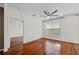 Bright bedroom features hardwood floors, a ceiling fan, and large windows at 10 Perimeter Summit Ne Blvd # 2110, Brookhaven, GA 30319