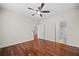 Open bedroom featuring hardwood floors and access to a bathroom and closet at 10 Perimeter Summit Ne Blvd # 2110, Brookhaven, GA 30319