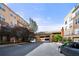 Apartment building exterior with visible parking garage at 10 Perimeter Summit Ne Blvd # 2110, Brookhaven, GA 30319