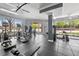 Well-equipped fitness center with modern exercise machines and large windows at 10 Perimeter Summit Ne Blvd # 2110, Brookhaven, GA 30319