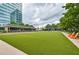Large, well-maintained community green space with outdoor seating at 10 Perimeter Summit Ne Blvd # 2110, Brookhaven, GA 30319