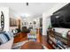 Spacious living room with hardwood floors, stylish furniture, and ample natural light at 10 Perimeter Summit Ne Blvd # 2110, Brookhaven, GA 30319