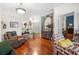 Inviting living room with hardwood floors, plush seating, and elegant decor at 10 Perimeter Summit Ne Blvd # 2110, Brookhaven, GA 30319