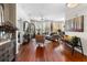 Bright living room showcasing hardwood floors, a ceiling fan, and natural light at 10 Perimeter Summit Ne Blvd # 2110, Brookhaven, GA 30319