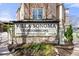 Villa Sonoma Condominiums sign with beautiful landscaping and a stone facade at 10 Perimeter Summit Ne Blvd # 2110, Brookhaven, GA 30319