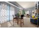 Comfortable sitting area with furniture, tables, and bright natural light from large window at 10 Perimeter Summit Ne Blvd # 2110, Brookhaven, GA 30319