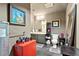 Modern bathroom with a floating vanity, open storage, and framed mirror, plus unique art and decor at 115 W Peachtree Nw Pl # 304, Atlanta, GA 30313