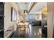 Open floor plan with dining table, kitchen, and living area; natural light at 115 W Peachtree Nw Pl # 304, Atlanta, GA 30313