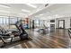 Well-equipped gym with treadmills, weights, and natural light, providing a complete fitness experience for residents at 115 W Peachtree Nw Pl # 304, Atlanta, GA 30313
