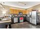 Modern kitchen with stainless steel appliances, ample counter space, and stylish lighting at 115 W Peachtree Nw Pl # 304, Atlanta, GA 30313