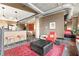 Spacious open-concept living area with industrial accents, concrete floors, and modern decor at 115 W Peachtree Nw Pl # 304, Atlanta, GA 30313