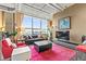 Stylish living room with large windows, comfortable seating, and bright area rug at 115 W Peachtree Nw Pl # 304, Atlanta, GA 30313